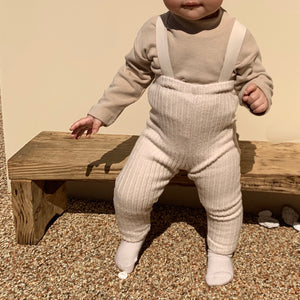 Turtleneck top + suspender pants